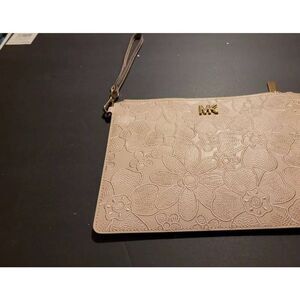 Michael kors Nwot pink clutch bag zipper closure flower in front 10in wide 7in